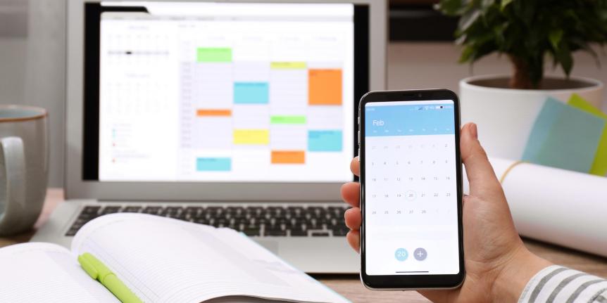 Calendar on a computer and phone.