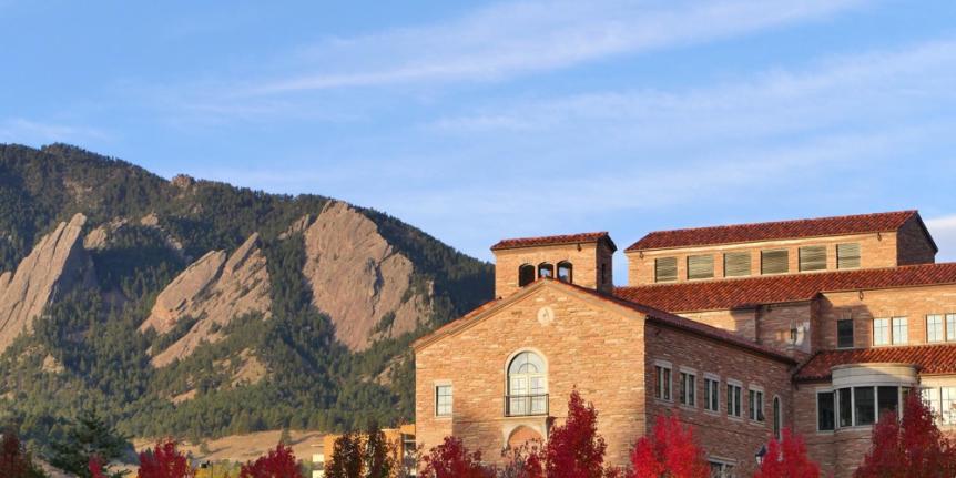 Photo of campus and flatirons during autumn